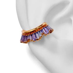 Ear cuff tanzanite and 20k rose gold. In perfect condition, new sells for $3,200